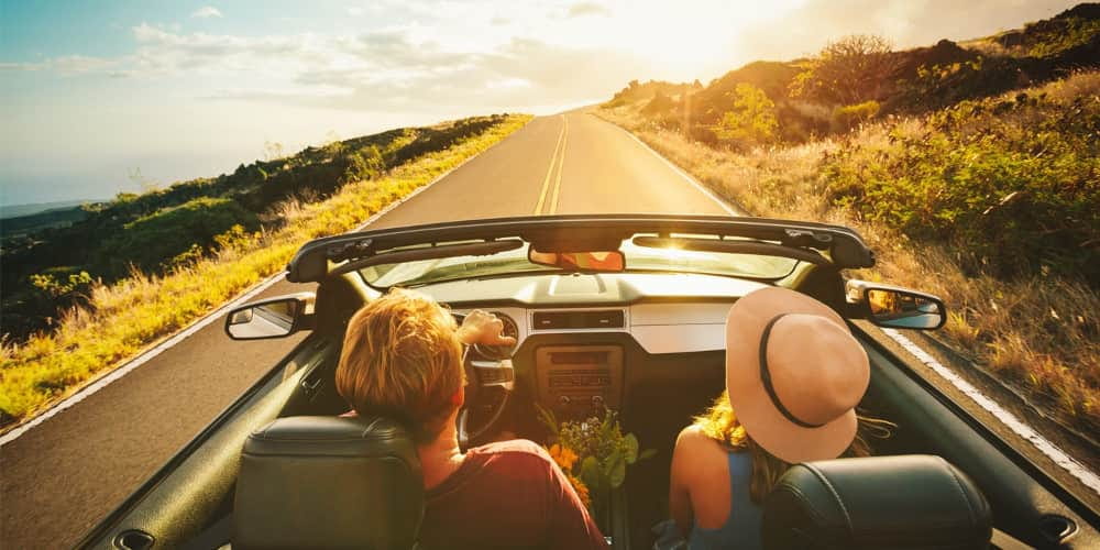 couple in convertible car